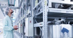 Man checking data in a facility