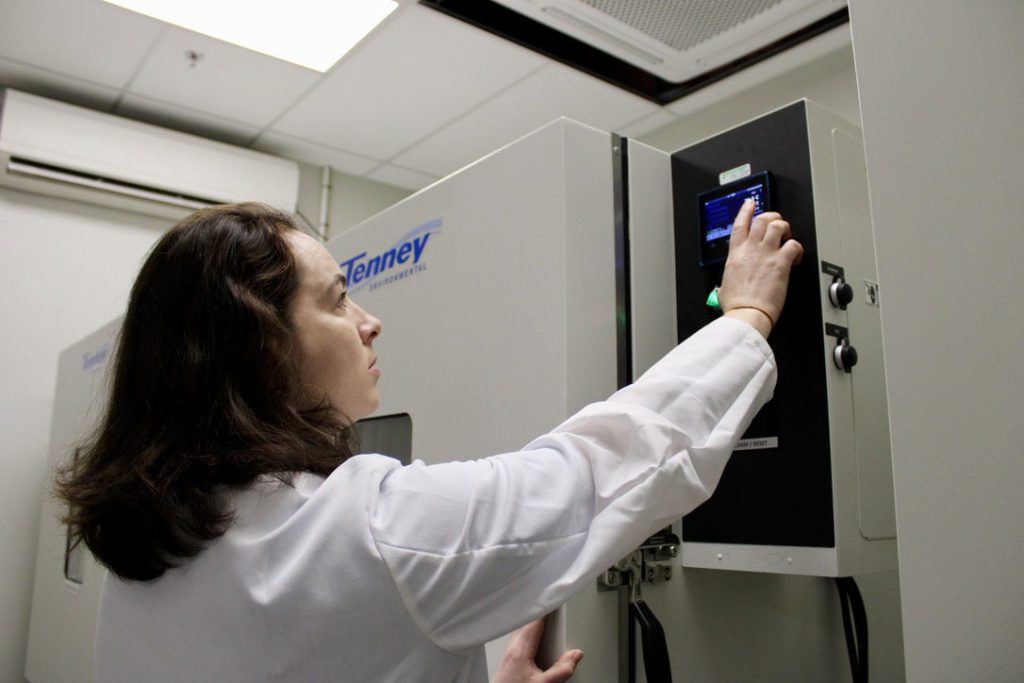 Nordic Cold Chain Solutions employee testing products in the lab