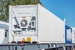 Refrigerated container 20-foot-long on the railway platform.