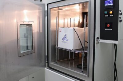 A white Nordic Ice shipping box sits inside a professional stainless steel environmental testing chamber with a digital control panel for ISTA-certified thermal validation.